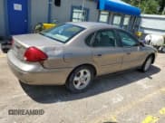 ✅ 2002 Ford Taurus SE Standard • VIN: 1FAFP53U42G207900 • Lot: 65726605. Listed on Copart with 241,028 mi. Free auction sales archive from the USA and detailed vehicle history report at DreamBid. Image 3.