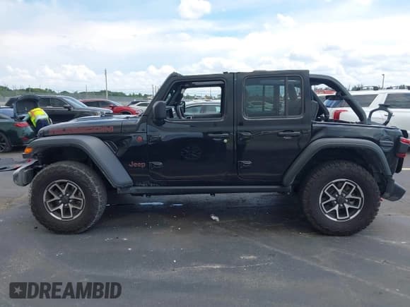 ✅ 2024 Jeep Wrangler Rubicon • VIN: 1C4PJXFG0RW350411 • Lot: 43039072. Listed on IAAI with 7,837 mi. Free auction sales archive from the USA and detailed vehicle history report at DreamBid. Image 14.