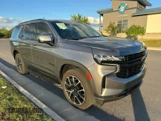 2021 Chevrolet Tahoe RST z VIN 1GNSKRKD9MR336603, wystawiony jako Copart lot #89450095 z przebiegiem 52 824 mil mil oraz Czysty tytuł • Clean title. Historia ofert i sprzedaży dostępna na DreamBid. Obrazek 1.