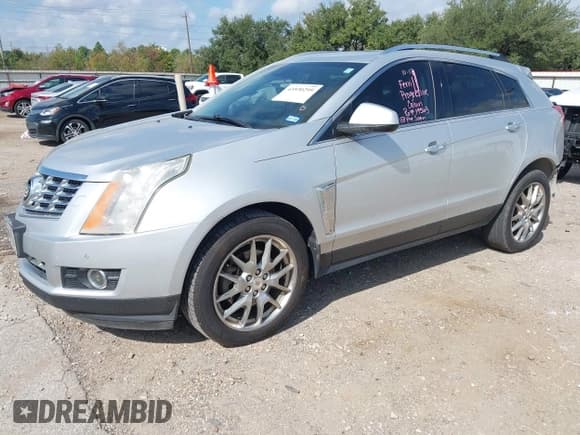 ✅ 2013 Cadillac SRX Performance Collection • VIN: 3GYFNDE30DS513053 • Lot: 43530295. Listed on IAAI with 124,178 mi. Free auction sales archive from the USA and detailed vehicle history report at DreamBid. Image 2.