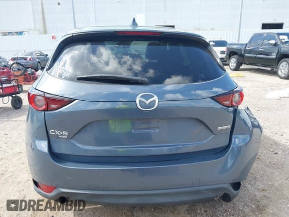 ✅ 2021 Mazda CX-5 Carbon Edition • VIN: JM3KFBCY0M0458896 • Лот: 42512723. Опубликован ранее на IAAI с пробегом 27 488 миль. Бесплатный доступ к архиву аукционных продаж из США и подробный отчёт об истории автомобиля на DreamBid. Изображение 16.