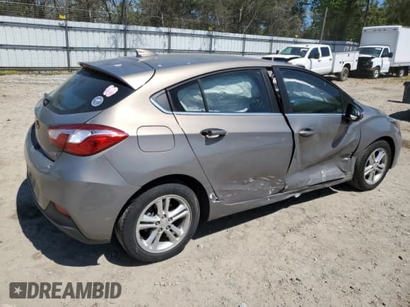 ✅ 2017 Chevrolet Cruze LT • VIN: 3G1BE6SM6HS572751 • Lot: 47690933. Listed on Copart with 65,685 mi. Free auction sales archive from the USA and detailed vehicle history report at DreamBid. Image 3.