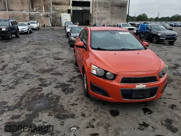 2012 Chevrolet Sonic LT z VIN 1G1JC5SH3C4171861, wystawiony jako Copart lot #71653174 z przebiegiem 169 648 mil mil oraz Szkoda całkowita • Salvage title. Historia ofert i sprzedaży dostępna na DreamBid. Obrazek 10.