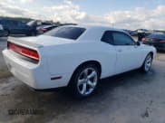 ✅ 2014 Dodge Challenger SXT • VIN: 2C3CDYAG7EH209786 • Lot: 80151564. Wystawiony na Copart z przebiegiem 129 689 mil. Bezpłatny archiwum sprzedaży aukcyjnych z USA i szczegółowy raport historii pojazdu na DreamBid. Zdjęcie 3.