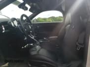 ✅ 2015 MINI Roadster S • VIN: WMWSY3C51FT595424 • Lot: 59268985. Wystawiony na Copart z przebiegiem 137 011 mil. Bezpłatny archiwum sprzedaży aukcyjnych z USA i szczegółowy raport historii pojazdu na DreamBid. Zdjęcie 7.