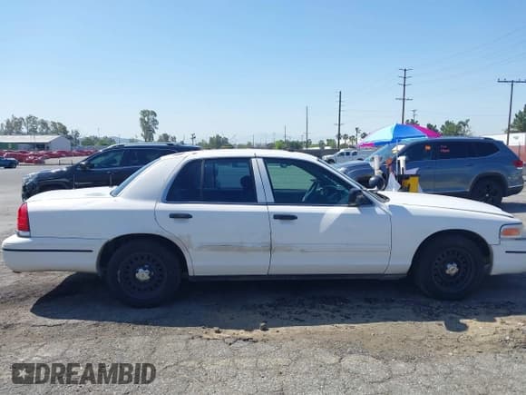 ✅ 1999 Ford Crown Victoria Police • VIN: 2FAFP71W1XX200937 • Лот: 41977836. Опубликован ранее на IAAI с пробегом 186 379 миль. Бесплатный доступ к архиву аукционных продаж из США и подробный отчёт об истории автомобиля на DreamBid. Изображение 12.