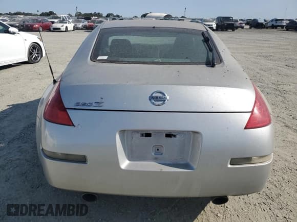 ✅ 2006 Nissan 350Z • VIN: JN1AZ34D16M309733 • Лот: 60576505. Опубликован ранее на Copart с пробегом 170 404 миль. Бесплатный доступ к архиву аукционных продаж из США и подробный отчёт об истории автомобиля на DreamBid. Изображение 6.
