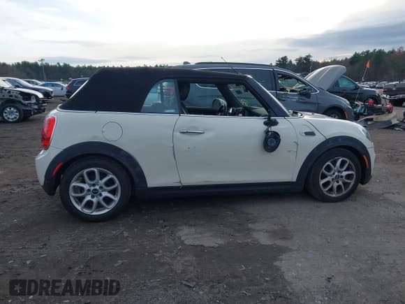 ✅ 2019 MINI Convertible Cooper • VIN: WMWWG5C51K3H07720 • Лот: 43660610. Опубликован ранее на IAAI с пробегом 52 494 миль. Бесплатный доступ к архиву аукционных продаж из США и подробный отчёт об истории автомобиля на DreamBid. Изображение 13.