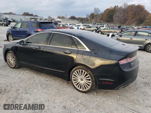 ✅ 2017 Lincoln MKZ Reserve • VIN: 3LN6L5F96HR643884 • Lot: 91460865. Wystawiony na Copart z przebiegiem 97 481 mil. Bezpłatny archiwum sprzedaży aukcyjnych z USA i szczegółowy raport historii pojazdu na DreamBid. Zdjęcie 2.