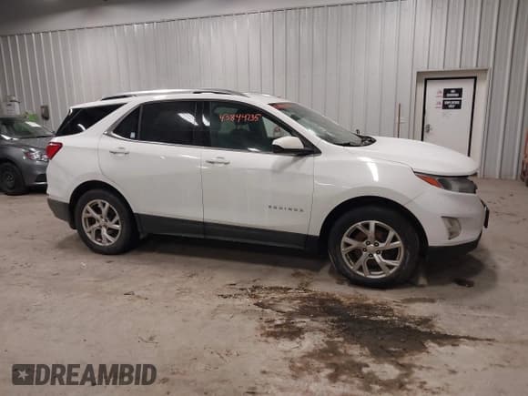 ✅ 2020 Chevrolet Equinox LT • VIN: 2GNAXVEX7L6132873 • Lot: 43844235. Listed on IAAI with 110,273 mi. Free auction sales archive from the USA and detailed vehicle history report at DreamBid. Image 13.