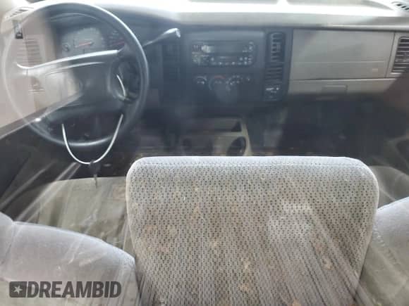 2003 Dodge Dakota z VIN 1D7FL16X73S307529, wystawiony jako Copart lot #73568784 z przebiegiem 314 924 mil mil oraz Szkoda całkowita • Salvage title. Historia ofert i sprzedaży dostępna na DreamBid. Obrazek 8.