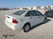 ✅ 2005 Ford Focus S • VIN: 1FAFP34N05W169006 • Lot: 92454825. Listed on Copart with Not provided. Free auction sales archive from the USA and detailed vehicle history report at DreamBid. Image 3.