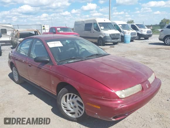 1998 Saturn SL z VIN 1G8ZK5277WZ156690, wystawiony jako IAAI lot #43106078 z przebiegiem 168 196 mil mil oraz . Historia ofert i sprzedaży dostępna na DreamBid. Obrazek 6.