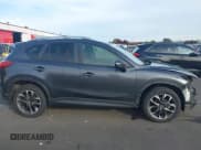 ✅ 2016 Mazda CX-5 Grand Touring • VIN: JM3KE4DY4G0880137 • Lot: 43516086. Wystawiony na IAAI z przebiegiem 135 661 mil. Bezpłatny archiwum sprzedaży aukcyjnych z USA i szczegółowy raport historii pojazdu na DreamBid. Zdjęcie 13.