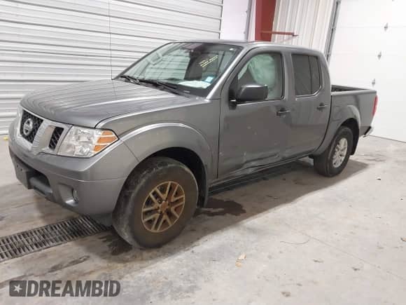 2020 Nissan Frontier SV with VIN 1N6ED0EB2LN712289, listed as a IAAI auction lot 41282636 with 67,976 mi miles and . Bid and sale history available at DreamBid. Image 2.