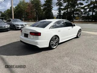 ✅ 2018 Audi S6 Premium Plus • VIN: WAUFFAFC9JN039803 • Лот: 74598804. Опубликован ранее на Copart с пробегом 77 940 миль. Бесплатный доступ к архиву аукционных продаж из США и подробный отчёт об истории автомобиля на DreamBid. Изображение 4.