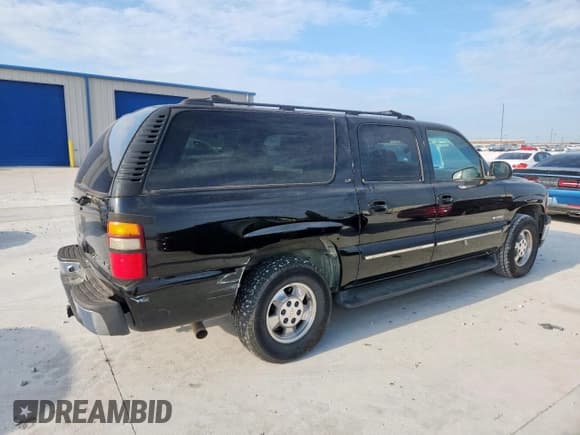 ✅ 2000 Chevrolet Suburban LS • VIN: 3GNEC16T1YG140979 • Lot: 70311565. Listed on Copart with 282,117 mi. Free auction sales archive from the USA and detailed vehicle history report at DreamBid. Image 3.