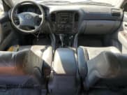 ✅ 2001 Toyota Land Cruiser • VIN: JTEHT05J912009163 • Лот: 70035625. Опубликован ранее на Copart с пробегом 340 034 миль. Бесплатный доступ к архиву аукционных продаж из США и подробный отчёт об истории автомобиля на DreamBid. Изображение 8.