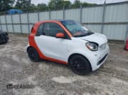 ✅ 2016 Smart fortwo Passion • VIN: WMEFJ5DA7GK059750 • Лот: 42931318. Опубликован ранее на IAAI с пробегом 83 880 миль. Бесплатный доступ к архиву аукционных продаж из США и подробный отчёт об истории автомобиля на DreamBid. Изображение 1.