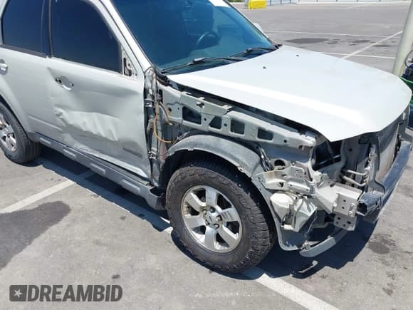 ✅ 2008 Ford Escape Limited • VIN: 1FMCU04128KB13867 • Lot: 42499448. Wystawiony na IAAI z przebiegiem 224 566 mil. Bezpłatny archiwum sprzedaży aukcyjnych z USA i szczegółowy raport historii pojazdu na DreamBid. Zdjęcie 6.