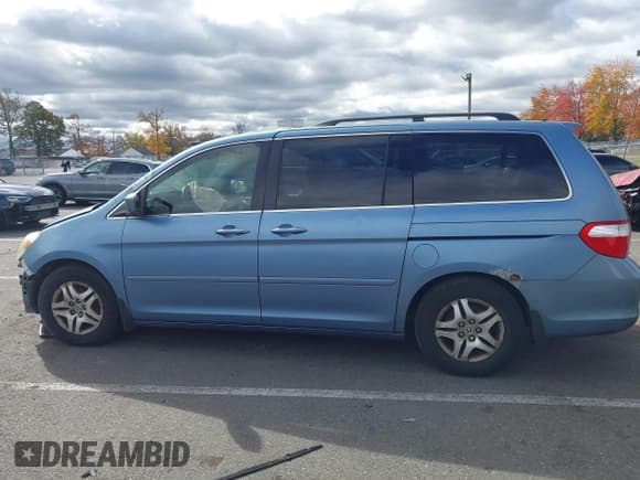 ✅ 2005 Honda Odyssey EX • VIN: 5FNRL38495B042456 • Lot: 43393225. Listed on IAAI with Not provided. Free auction sales archive from the USA and detailed vehicle history report at DreamBid. Image 14.