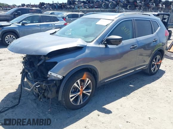 ✅ 2017 Nissan Rogue SL • VIN: 5N1AT2MT0HC884605 • Lot: 42080330. Listed on IAAI with 85,736 mi. Free auction sales archive from the USA and detailed vehicle history report at DreamBid. Image 16.