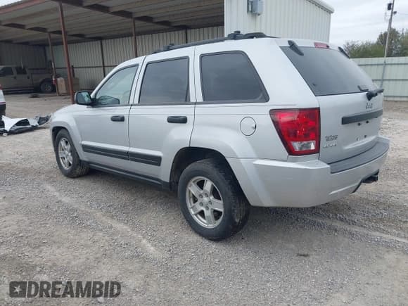 ✅ 2005 Jeep Grand Cherokee Laredo • VIN: 1J4GR48K95C661219 • Lot: 43694482. Listed on IAAI with 156,190 mi. Free auction sales archive from the USA and detailed vehicle history report at DreamBid. Image 3.