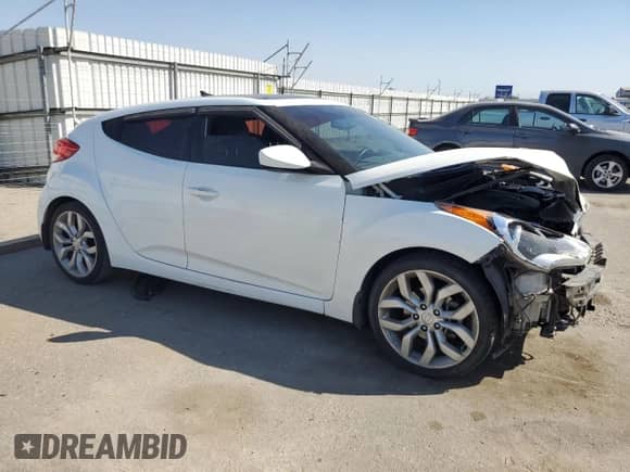 2013 Hyundai Veloster w/Black Int с VIN KMHTC6AD4DU147327, выставлен на аукционе Copart как лот 70406034 с пробегом 121 381 миль миль и Списание • Salvage title. История ставок и продаж доступна на DreamBid. Изображение 4.