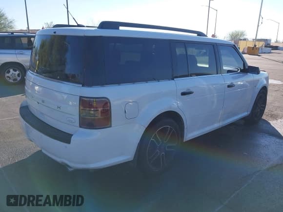 ✅ 2014 Ford Flex SEL • VIN: 2FMGK5C85EBD35568 • Lot: 43787534. Listed on IAAI with 157,253 mi. Free auction sales archive from the USA and detailed vehicle history report at DreamBid. Image 4.