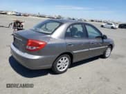 ✅ 2004 Kia Rio • VIN: KNADC125346339018 • Лот: 68951385. Опубликован ранее на Copart с пробегом 195 086 миль. Бесплатный доступ к архиву аукционных продаж из США и подробный отчёт об истории автомобиля на DreamBid. Изображение 3.