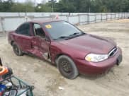 ✅ 1999 Ford Contour LX • VIN: 1FAFP653XXK106939 • Lot: 84759455. Listed on Copart with 233,891 mi. Free auction sales archive from the USA and detailed vehicle history report at DreamBid. Image 4.