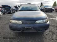 ✅ 2000 Oldsmobile Alero GLS • VIN: 1G3NF12E3YC416007 • Лот: 76420864. Опубликован ранее на Copart с пробегом 161 678 миль. Бесплатный доступ к архиву аукционных продаж из США и подробный отчёт об истории автомобиля на DreamBid. Изображение 5.
