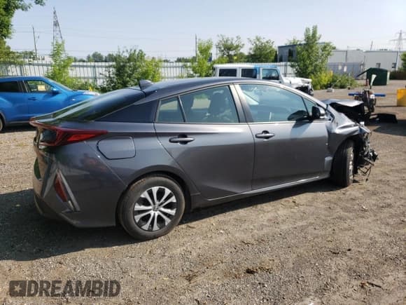 ✅ 2022 Toyota Prius LE • VIN: JTDKAMFP1N3223218 • Lot: 58561985. Listed on Copart with 98,017 mi. Free auction sales archive from the USA and detailed vehicle history report at DreamBid. Image 3.