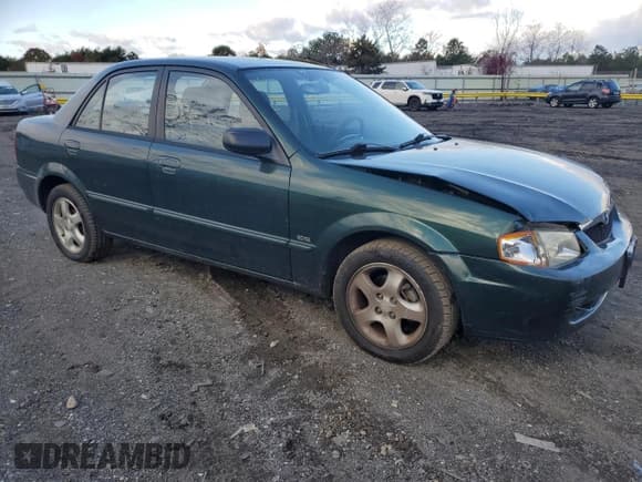 ✅ 2000 Mazda Protege ES • VIN: JM1BJ2210Y0276679 • Лот: 91638425. Опубликован ранее на Copart с пробегом 150 449 миль. Бесплатный доступ к архиву аукционных продаж из США и подробный отчёт об истории автомобиля на DreamBid. Изображение 4.