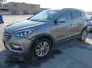 2017 Hyundai Santa Fe 2.0T z VIN 5XYZU4LA7HG406516, wystawiony jako IAAI lot #41847977 z przebiegiem 105 299 mil mil oraz . Historia ofert i sprzedaży dostępna na DreamBid. Obrazek 2.