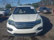 ✅ 2016 Honda Pilot EX • VIN: 5FNYF5H39GB008168 • Lot: 43722614. Listed on IAAI with 179,907 mi. Free auction sales archive from the USA and detailed vehicle history report at DreamBid. Image 12.