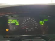 ✅ 1998 Lincoln Town Car Signature • VIN: 1LNFM82W1WY723330 • Lot: 70210235. Listed on Copart with 87,103 mi. Free auction sales archive from the USA and detailed vehicle history report at DreamBid. Image 9.