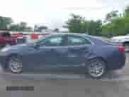 2015 Chevrolet Malibu LT z VIN 1G11C5SL9FF235771, wystawiony jako IAAI lot #39303861 z przebiegiem 109 571 mil mil oraz . Historia ofert i sprzedaży dostępna na DreamBid. Obrazek 6.