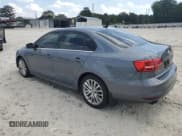 ✅ 2015 Volkswagen Jetta SE • VIN: 3VWD07AJ8FM318503 • Lot: 82072295. Listed on Copart with 77,037 mi. Free auction sales archive from the USA and detailed vehicle history report at DreamBid. Image 2.