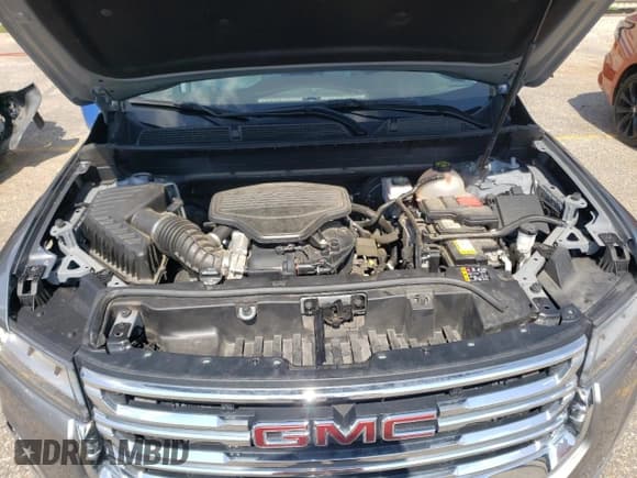 ✅ 2023 GMC Acadia SLT • VIN: 1GKKNMLS0PZ135293 • Lot: 61810815. Listed on Copart with 65,953 mi. Free auction sales archive from the USA and detailed vehicle history report at DreamBid. Image 12.