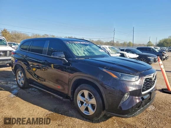 ✅ 2022 Toyota Highlander LE • VIN: 5TDZZRAH2NS108081 • Lot: 94921375. Listed on Copart with 98,256 mi. Free auction sales archive from the USA and detailed vehicle history report at DreamBid. Image 4.