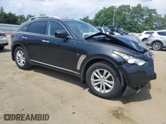 ✅ 2014 Infiniti QX70 • VIN: JN8CS1MW2EM412470 • Lot: 67048245. Listed on Copart with 156,591 mi. Free auction sales archive from the USA and detailed vehicle history report at DreamBid. Image 4.