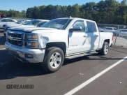 ✅ 2015 Chevrolet Silverado 1500 LT • VIN: 3GCUKREC8FG406972 • Lot: 43406080. Listed on IAAI with 143,634 mi. Free auction sales archive from the USA and detailed vehicle history report at DreamBid. Image 18.