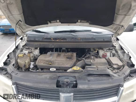 2010 Dodge Journey SE z VIN 3D4PG4FB7AT198982, wystawiony jako IAAI lot #43435599 z przebiegiem 202 565 mil mil oraz . Historia ofert i sprzedaży dostępna na DreamBid. Obrazek 10.