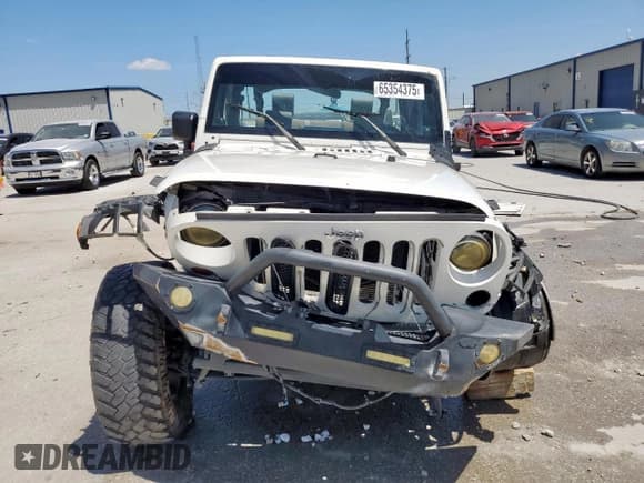 ✅ 2009 Jeep Wrangler Unlimited X • VIN: 1J4GA39109L720915 • Lot: 65354375. Wystawiony na Copart z przebiegiem Nie podano. Bezpłatny archiwum sprzedaży aukcyjnych z USA i szczegółowy raport historii pojazdu na DreamBid. Zdjęcie 5.