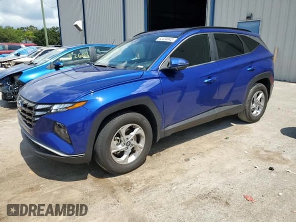 ✅ 2022 Hyundai Tucson SEL • VIN: 5NMJB3AE0NH109902 • Lot: 62434943. Wystawiony na Copart z przebiegiem 26 075 mil. Bezpłatny archiwum sprzedaży aukcyjnych z USA i szczegółowy raport historii pojazdu na DreamBid. Zdjęcie 1.