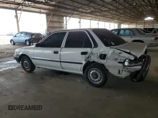 ✅ 1992 Toyota Corolla • VIN: 1NXAE91A6NZ330349 • Lot: 50472445. Listed on Copart with 218,525 mi. Free auction sales archive from the USA and detailed vehicle history report at DreamBid. Image 2.