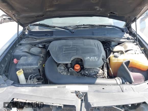 2012 Dodge Challenger SXT Plus z VIN 2C3CDYAG8CH176729, wystawiony jako IAAI lot #43219864 z przebiegiem 165 076 mil mil oraz . Historia ofert i sprzedaży dostępna na DreamBid. Obrazek 10.