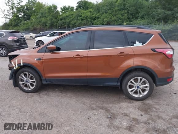 ✅ 2017 Ford Escape SE • VIN: 1FMCU9GD7HUD95311 • Lot: 42685526. Listed on IAAI with 95,785 mi. Free auction sales archive from the USA and detailed vehicle history report at DreamBid. Image 14.