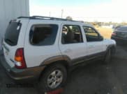 ✅ 2003 Mazda Tribute LX • VIN: 4F2YZ04153KM18168 • Lot: 39240269. Listed on IAAI with 225,859 mi. Free auction sales archive from the USA and detailed vehicle history report at DreamBid. Image 4.